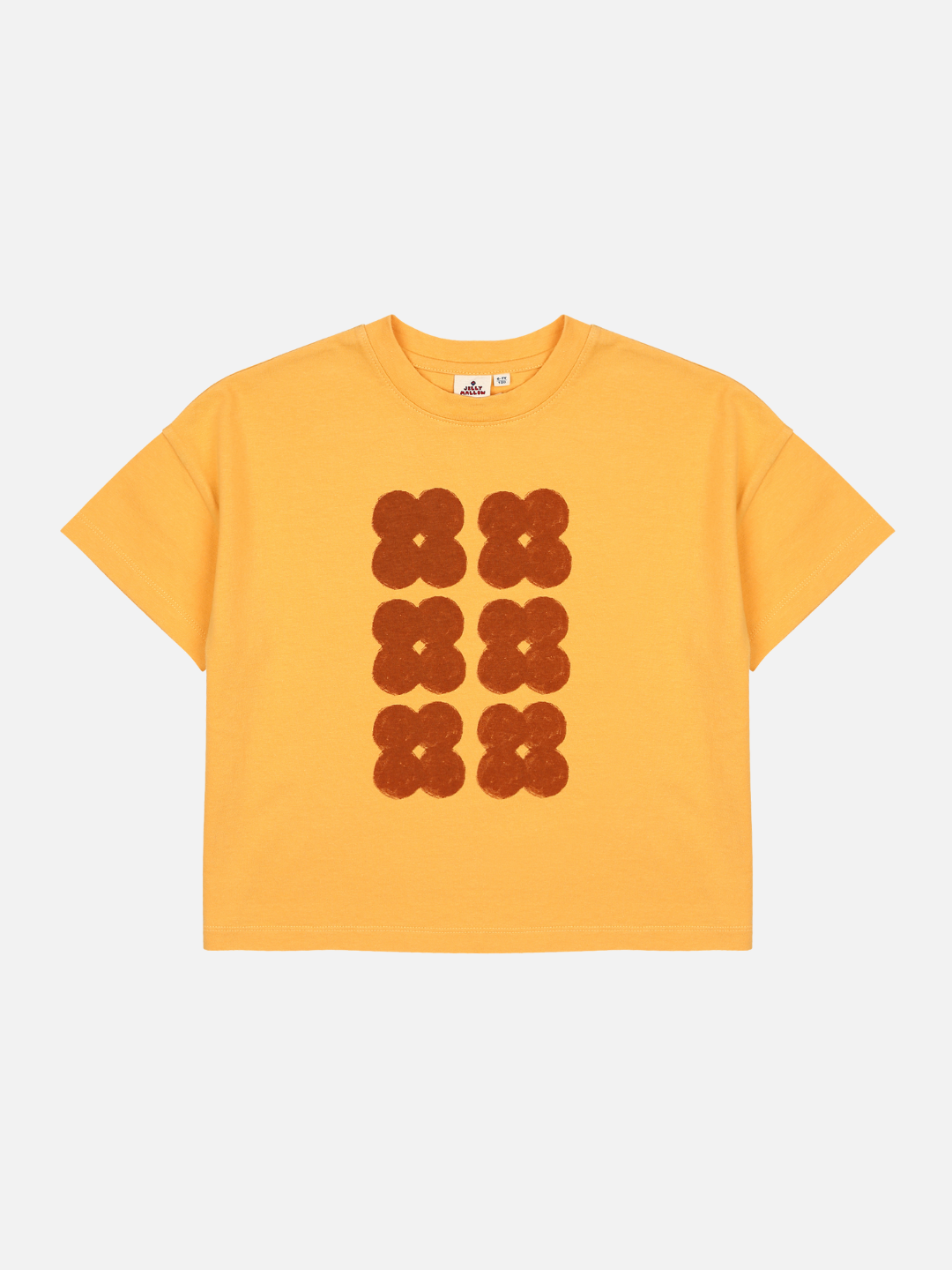 Front of T-shirt with six dark orange clover shapes in two vertical rows on a yellow background.