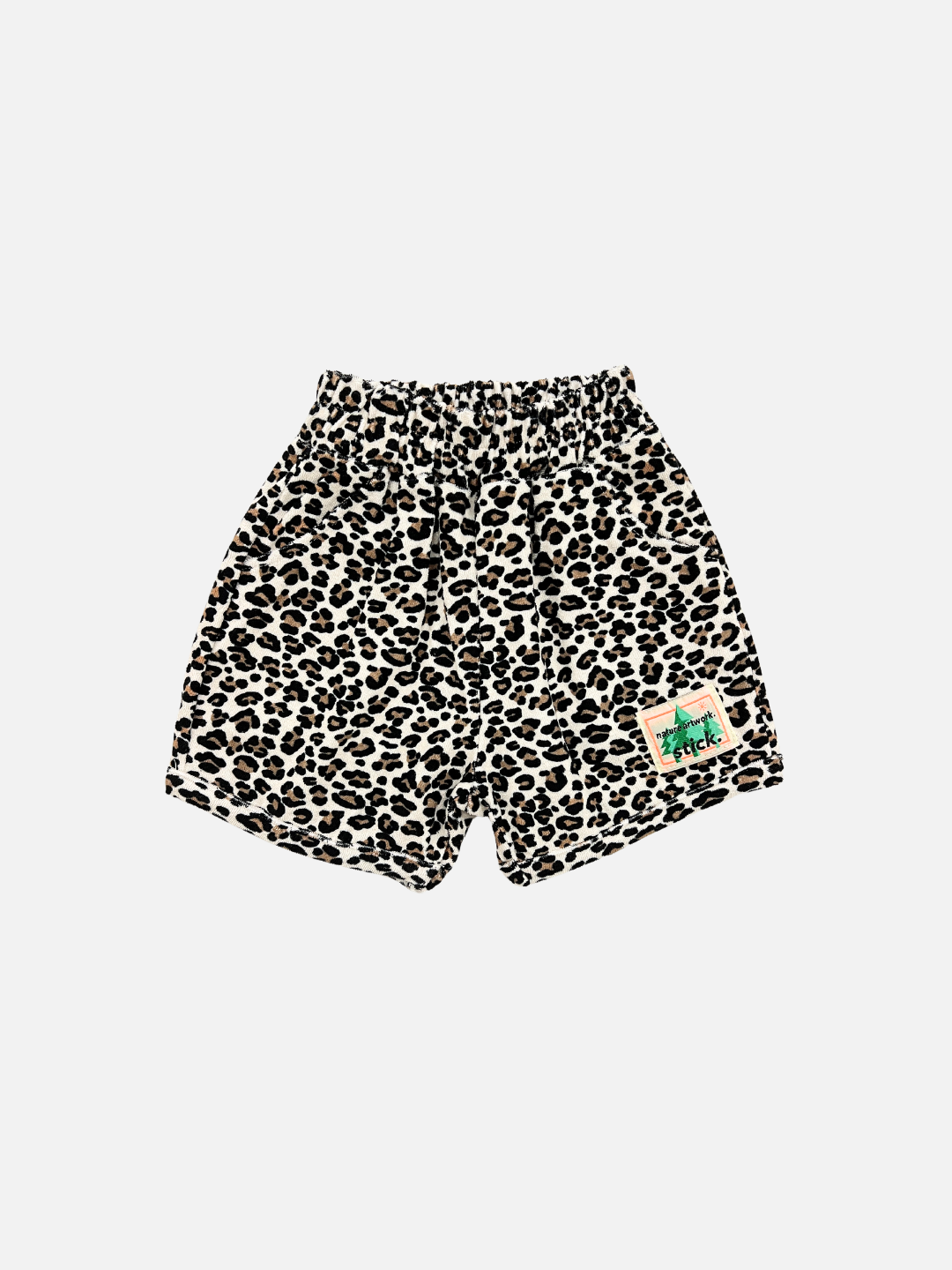 Front view of the kids' Leopard print terrycloth shorts. Stick brand logo on the right leg.