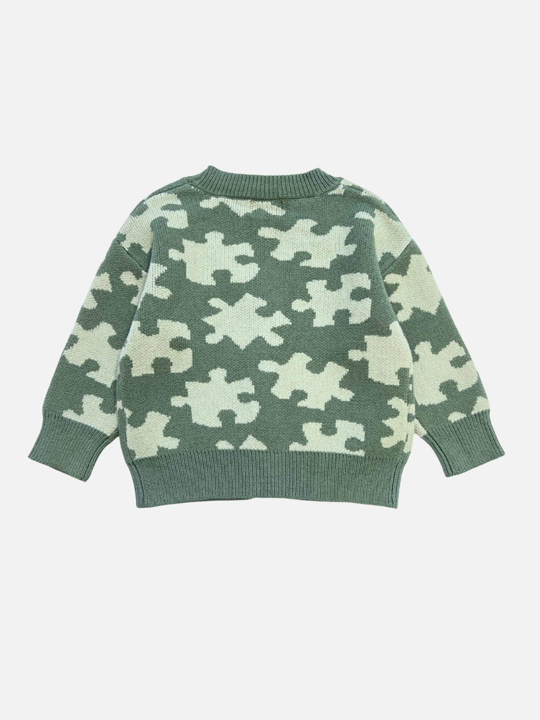 Green | The PUZZLE CARDIGAN is a green sweater featuring a light green and cream puzzle piece pattern, shown flat on a white background.