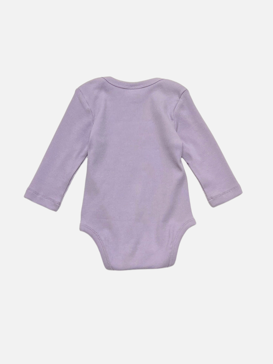 Second image of Lavender PRETZEL LONG SLEEVE ONESIE featuring a red smiley pretzel graphic on the front, displayed against a plain white background.