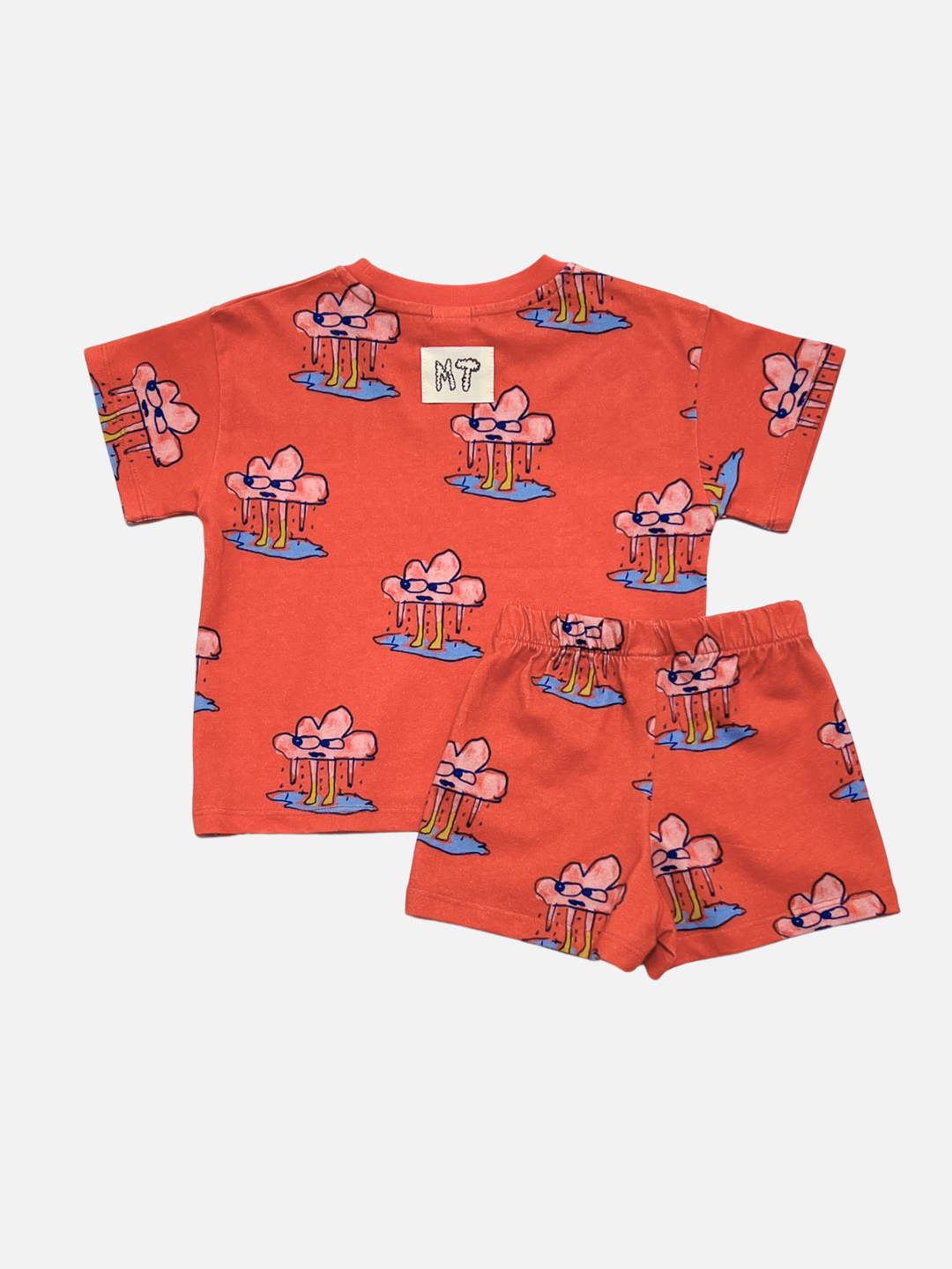 Red | The RAINY DAY SHORT SET is a children's unisex red matching set, made from soft organic cotton, featuring a playful hand-drawn raincloud print. Shown on a white background.