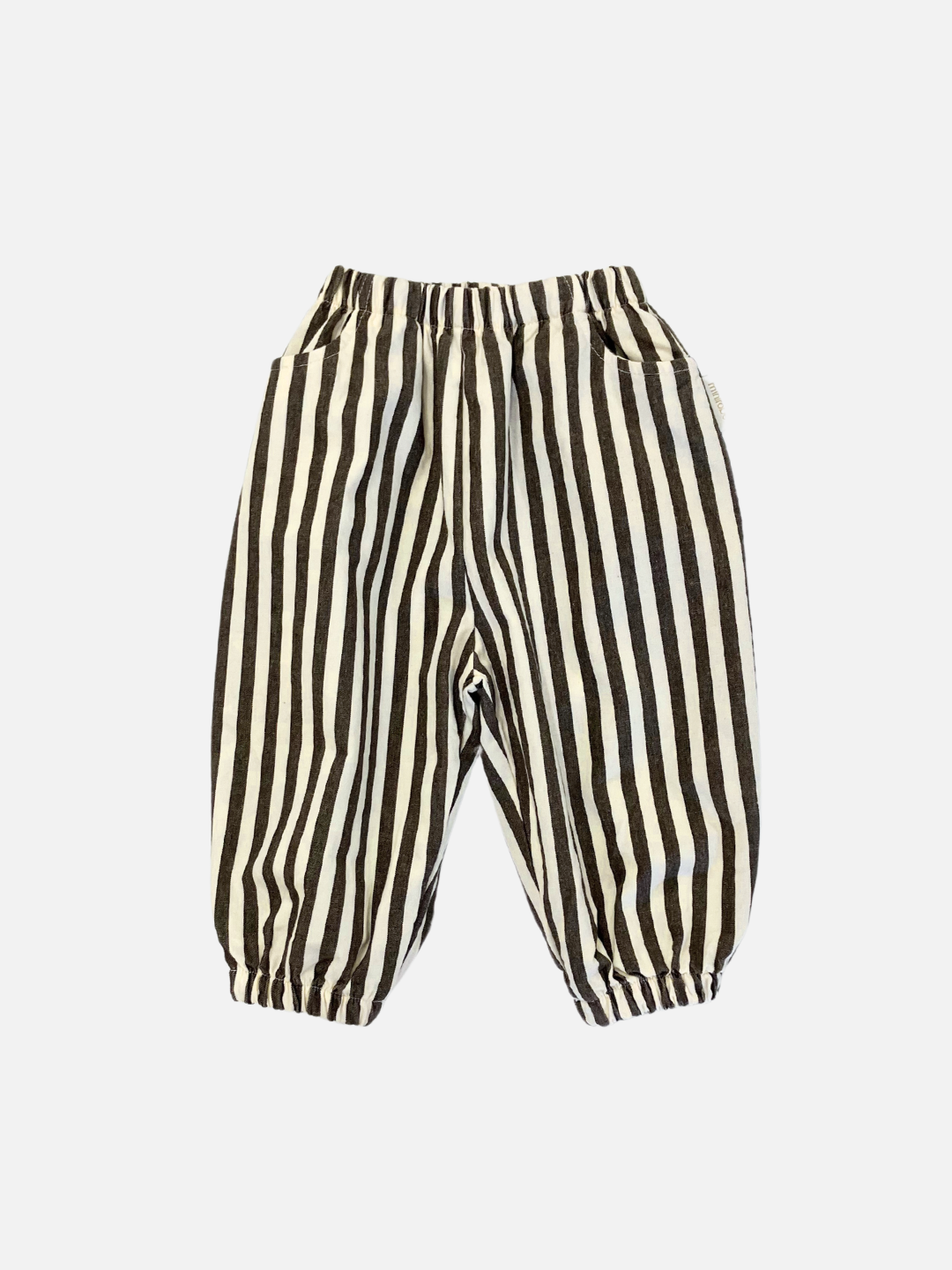 Charcoal Stripe | Pair of charcoal striped cotton PIRATE PANTS for a child, featuring an elastic waistband and cuffs. With a playful balloon leg design, these Minirobe essentials are perfect for any stylish little one.