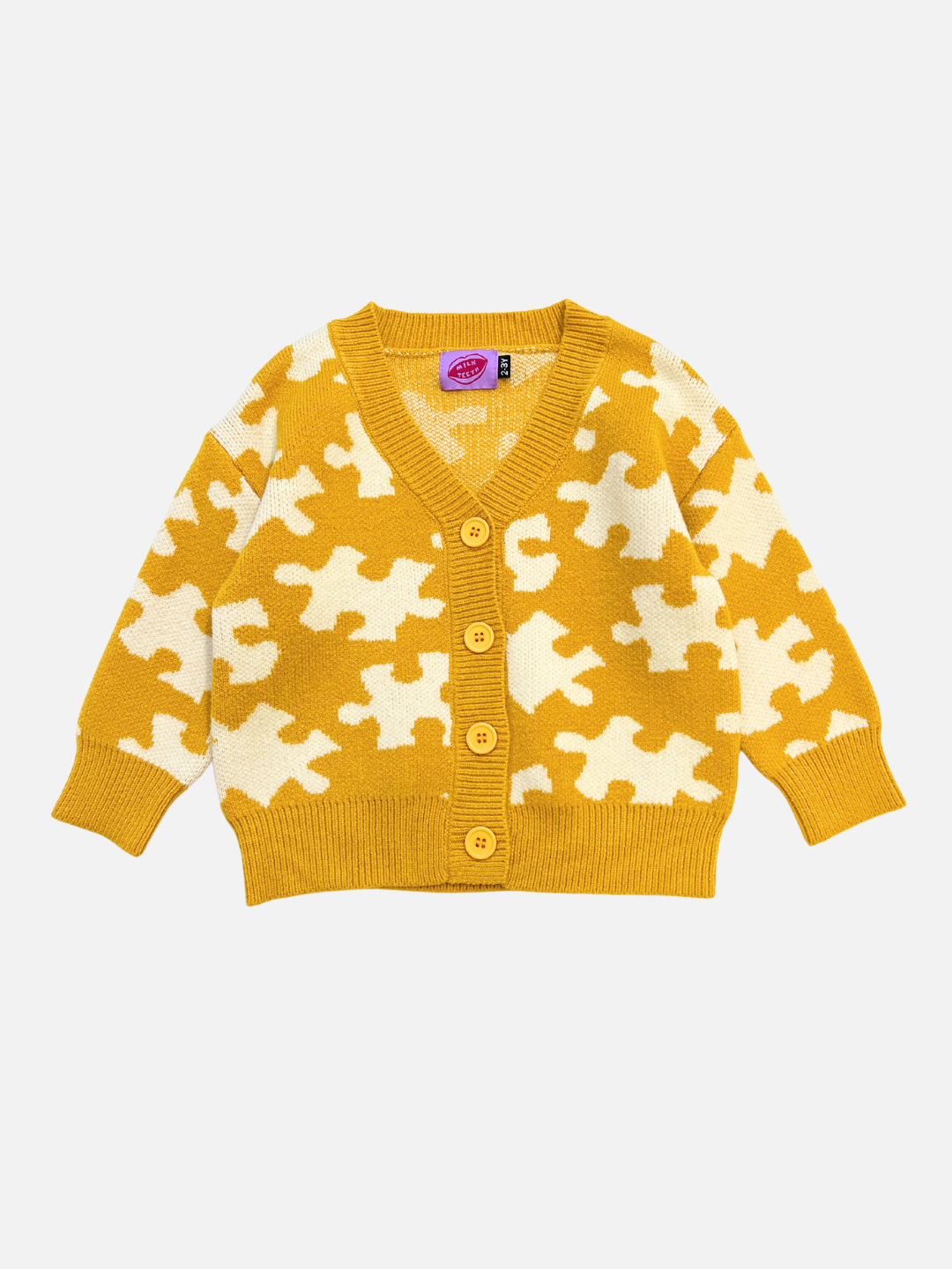 Yellow | The PUZZLE CARDIGAN is a yellow knitted children's cardigan featuring a puzzle piece pattern, long sleeves, and four yellow buttons down the front.