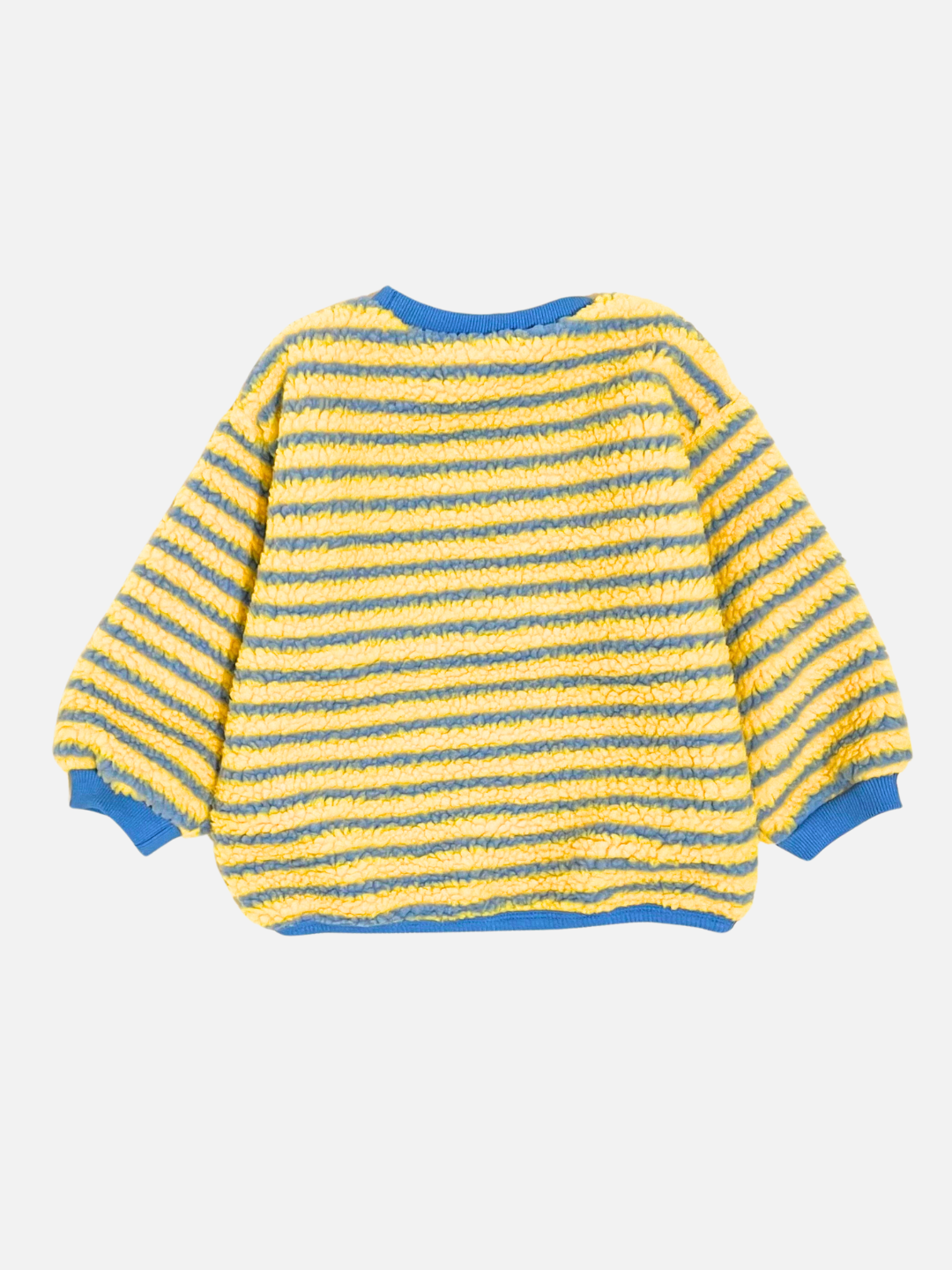 Blue/Yellow |  The GLOW WORM SWEATSHIRT is a striped yellow and gray fuzzy sweater with blue trim, featuring long sleeves and a crew neckline, offering an oversized boxy fit. Designed by a popular Korean kids brand, it seamlessly combines style and comfort.