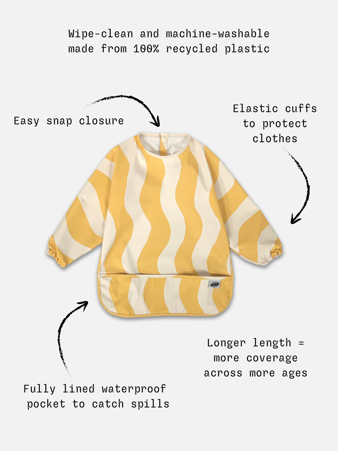 Detailed information  of the long sleeve yellow and white wavy bib and a front pocket.