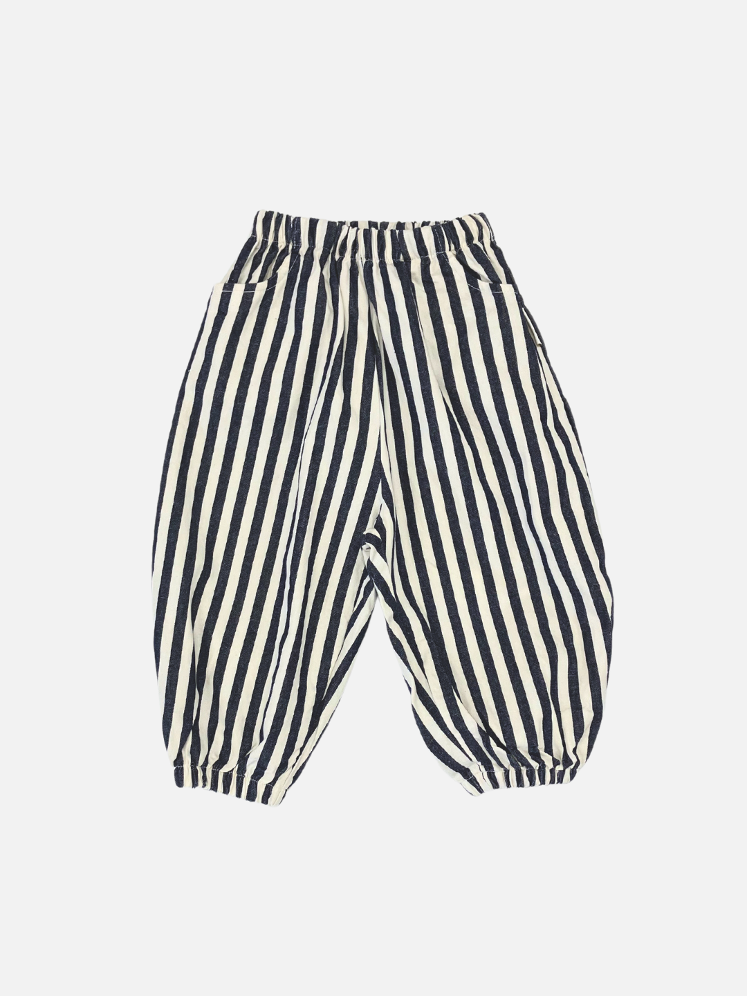 Navy Stripe | Navy vertically striped cotton "PIRATE PANTS" with a balloon leg design, featuring an elastic waistband and hemmed cuffs, displayed against a plain white background.