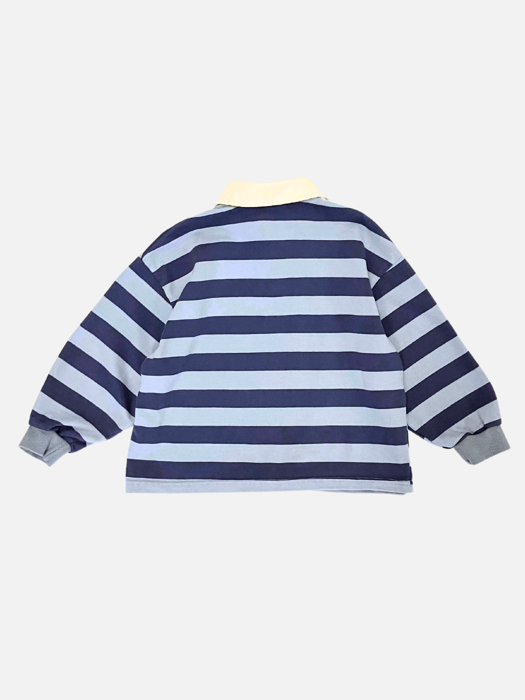 Blue | The RUGBY LONGSLEEVE, a collared sweater with horizontal navy blue and light blue stripes made from soft cotton jersey, shown from the back.