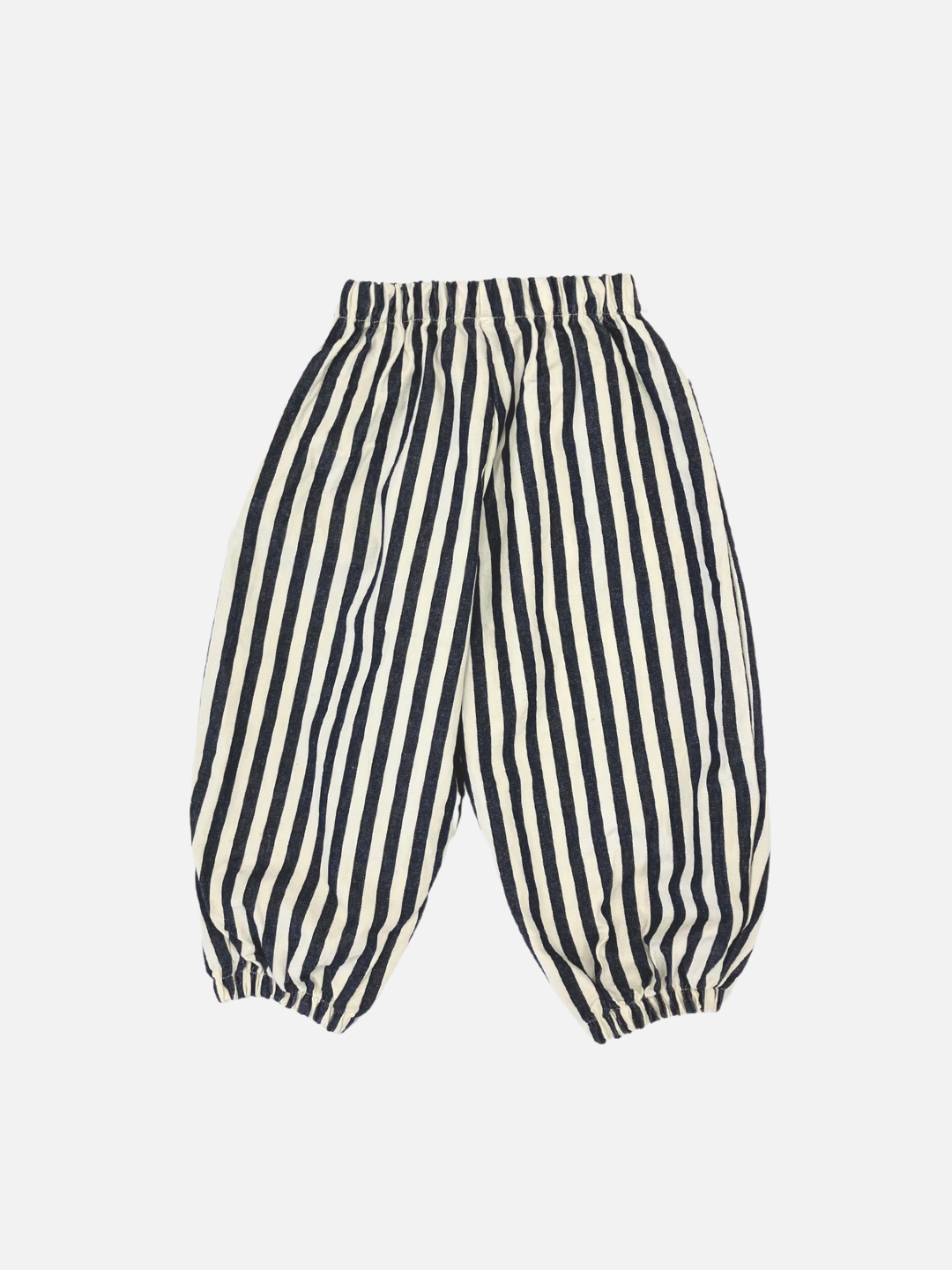 Navy Stripe | PIRATE PANTS by Minirobe are black and white vertically striped cotton pants with balloon legs, featuring an elastic waistband and elastic cuffs at the ankles.