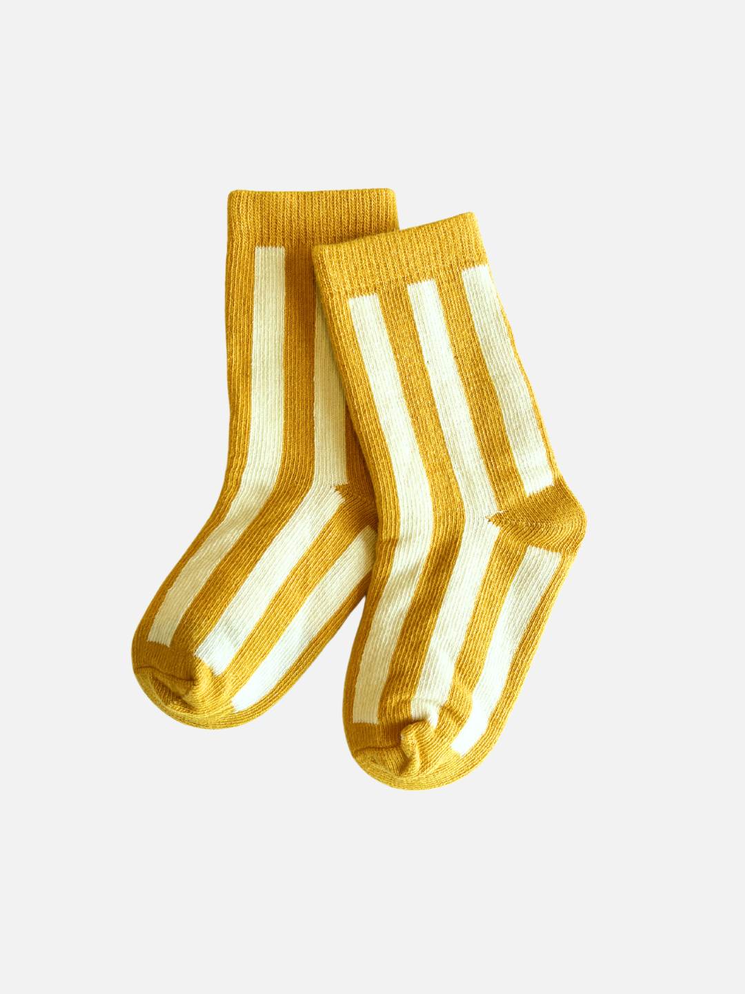 Marigold | A pair of comfy STRIPE SOCK in marigold with vertical white stripes, crafted from stretchy cotton, on a plain white background.