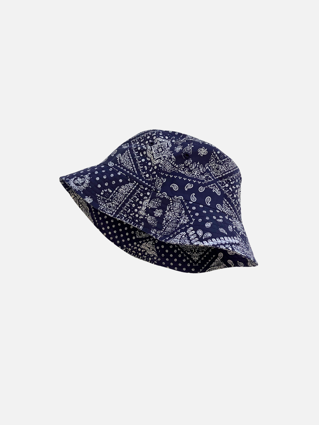  A navy kids bucket hat with bandana print shown from the side