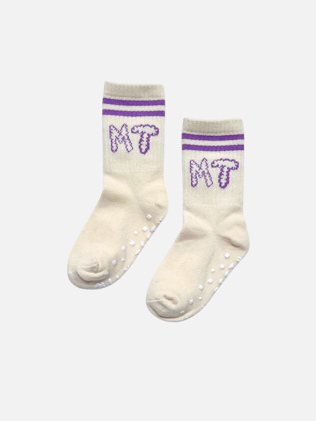 Pair of cream socks with purple accents and 'MT' branding on a white background