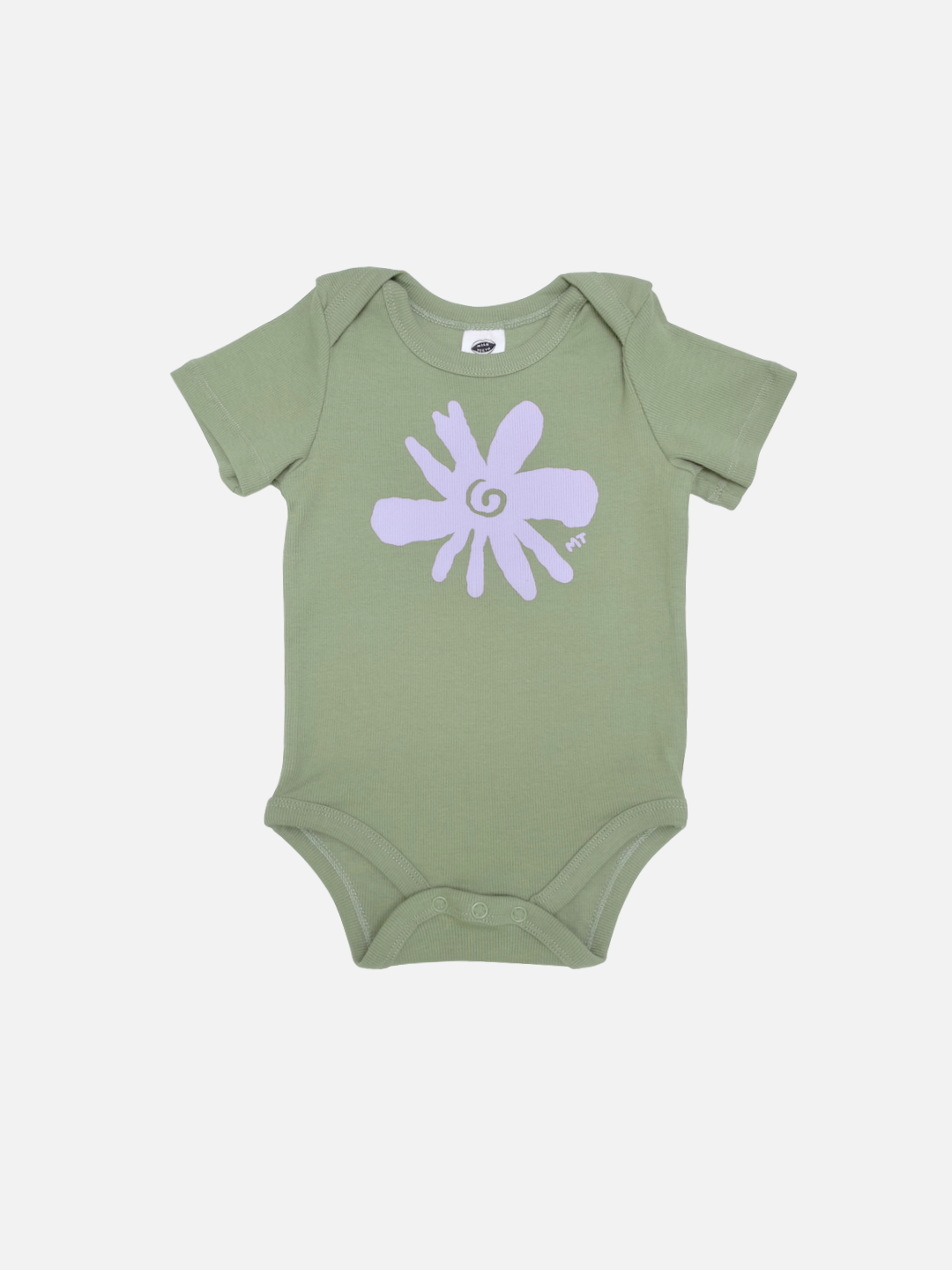 Green | The FLOWER SHORT SLEEVE ONESIE is a green ribbed cotton baby bodysuit with short sleeves and a bold lavender flower graphic on the front. Designed for easy diaper changes, shown against a plain white background.