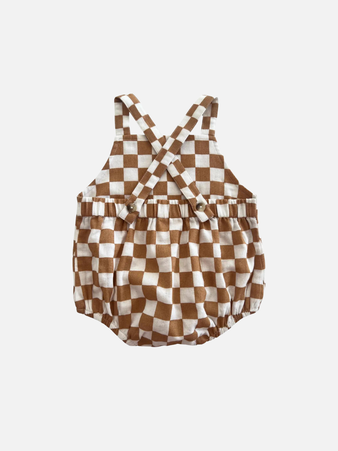 A brown and white checkerboard kids' sunsuit, rear view, with crossback straps