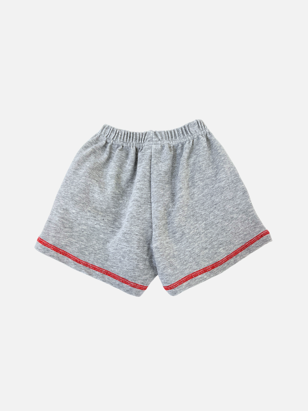 Grey | The gray VARSITY SWEAT SHORTS, boasting a vintage look with brushed cotton, elastic waistband, and red trim, are presented on a white backdrop. They're a top pick from a renowned Korean kids' brand.