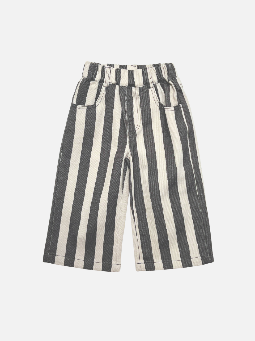 A pair of wide-leg kids pants featuring bold vertical black and off-white stripes, displayed flat against a light gray background.
