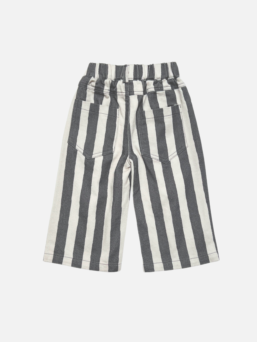 Back view of pair of wide-leg kids baggy jeans with vertical black and off-white stripes, featuring an elastic waistband and side pockets, shown against a light gray background.