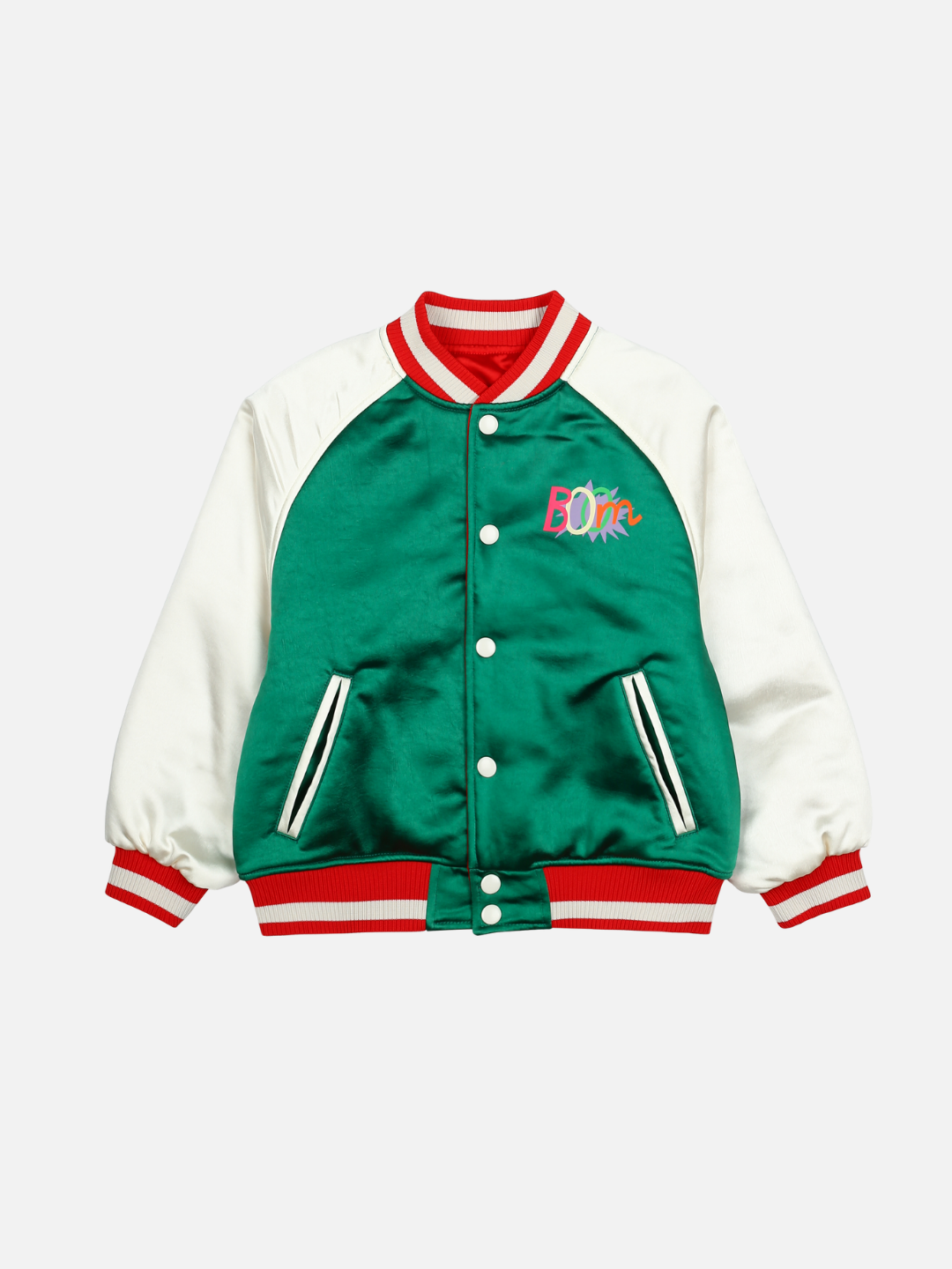 The BOOM REVERSIBLE JACKET is a stylish green and white varsity jacket featuring red and white striped ribbed cuffs, collar, and hem. It has a button-up front with green front pockets outlined in white. The left chest area displays a vibrant embroidered "BOOM" design, making it perfect for merchandising high-impact outerwear.