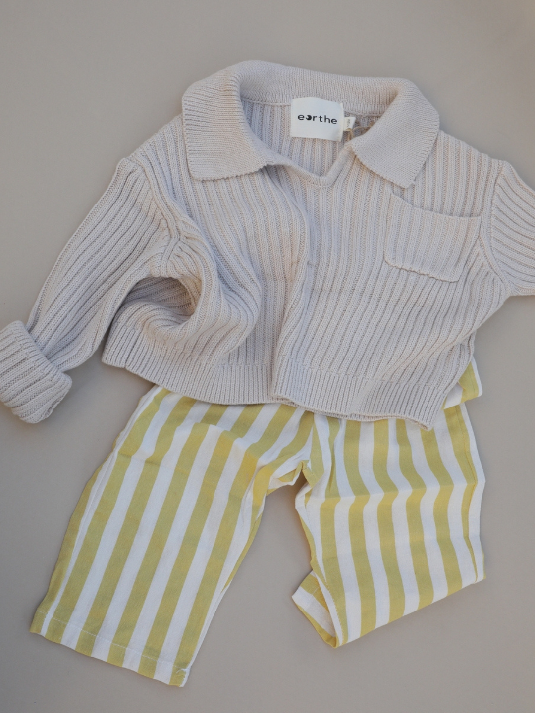 Yellow | Yellow stripe pants & sweater flatlay outfit