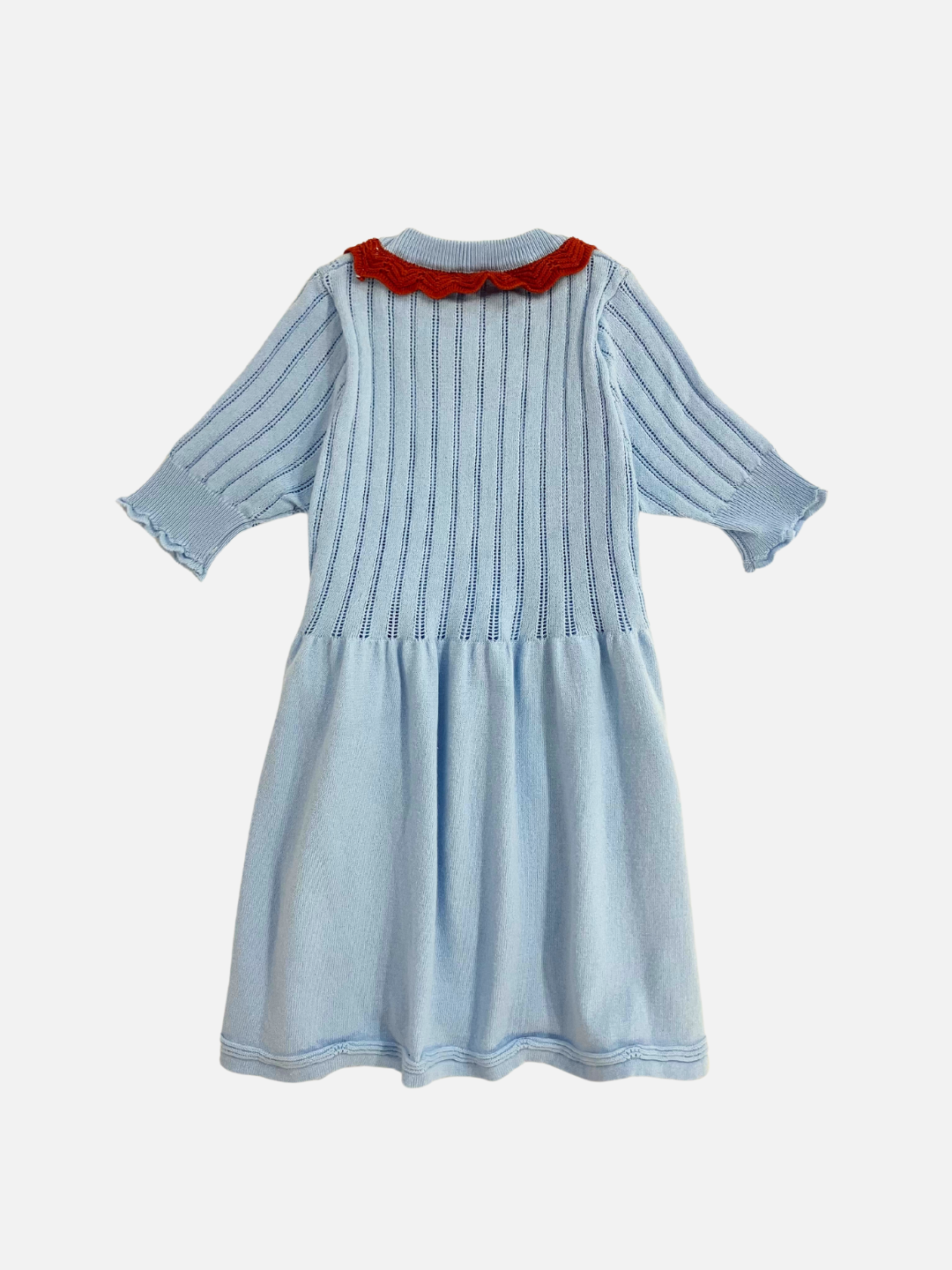 Sky Blue | Back view of the kid's Marlowe knit dress in Sky Blue with a quarter sleeve length and brick contrast collar 