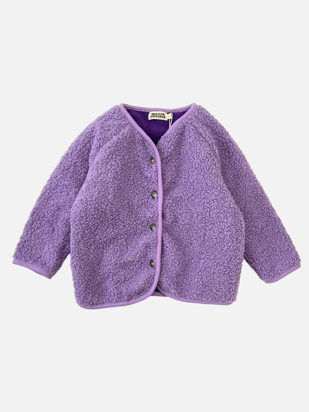 Front view of a kids purple collarless fleece jacket with four brown buttons.