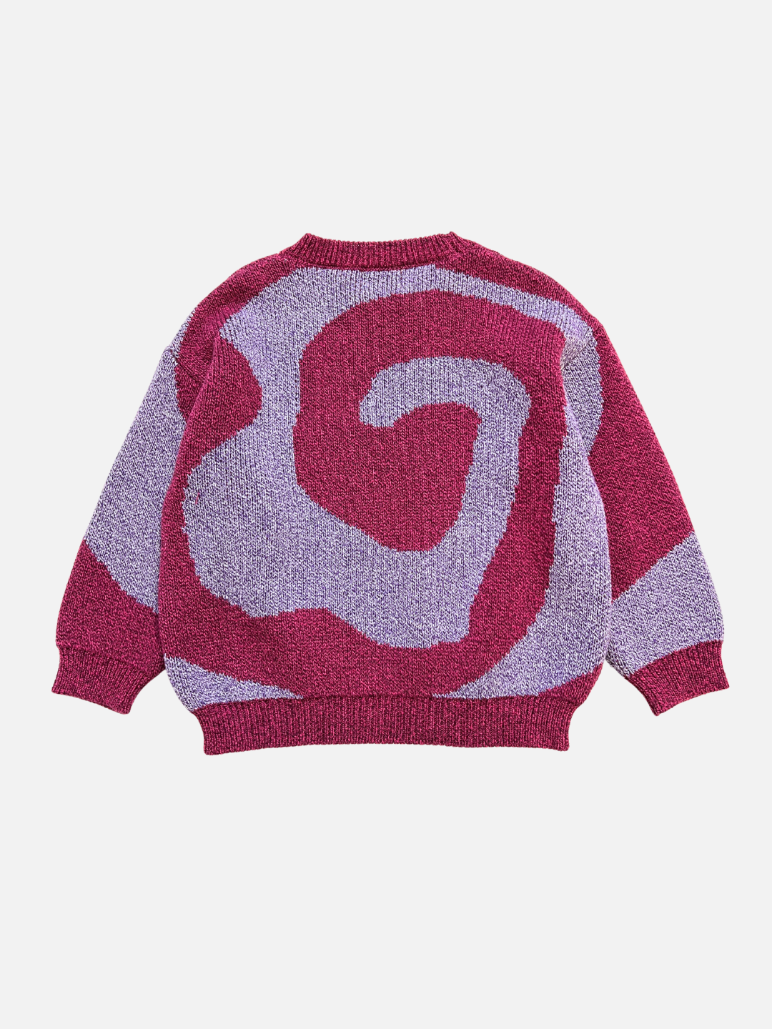 Pink/Purple | The SWIRL SWEATER is a knit sweater with long sleeves, showcasing a bold abstract swirl pattern in purple and maroon on a white background.