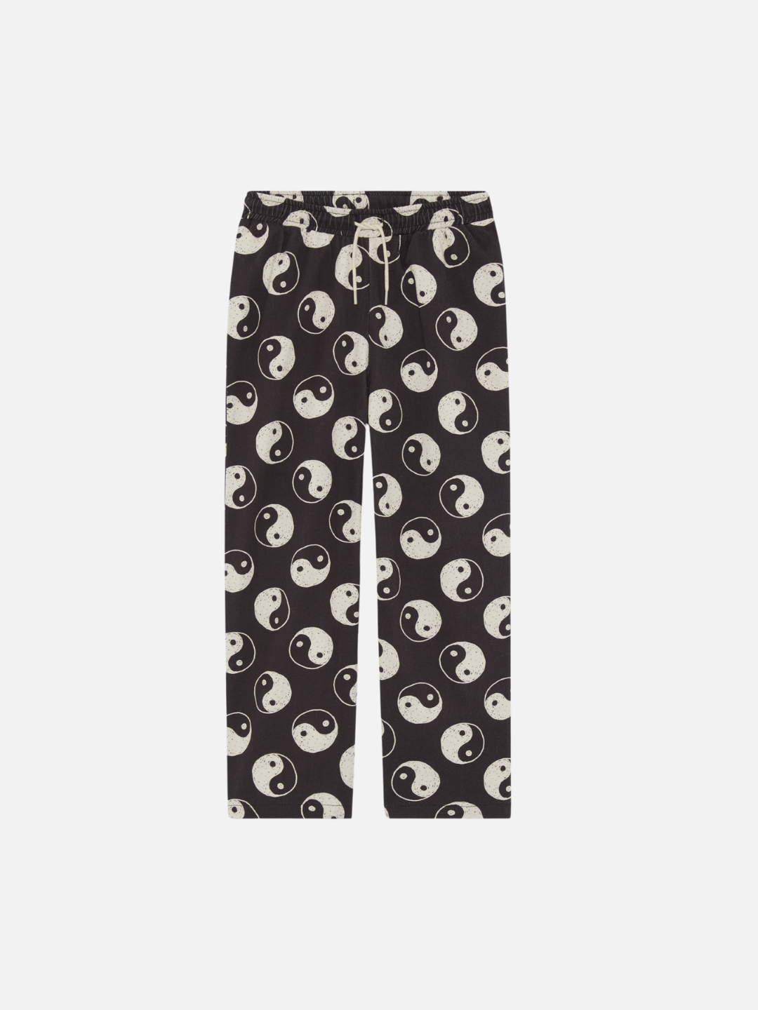 A front view of the drawstring black pants with a yin and yang pattern all over.