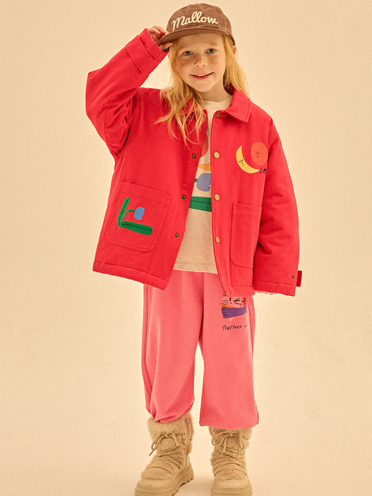 Second image of The COLORED NATURE JACKET features a red button-up style with two front pockets, a yellow and red embroidered face on the left chest, and a green and purple flower on the right pocket