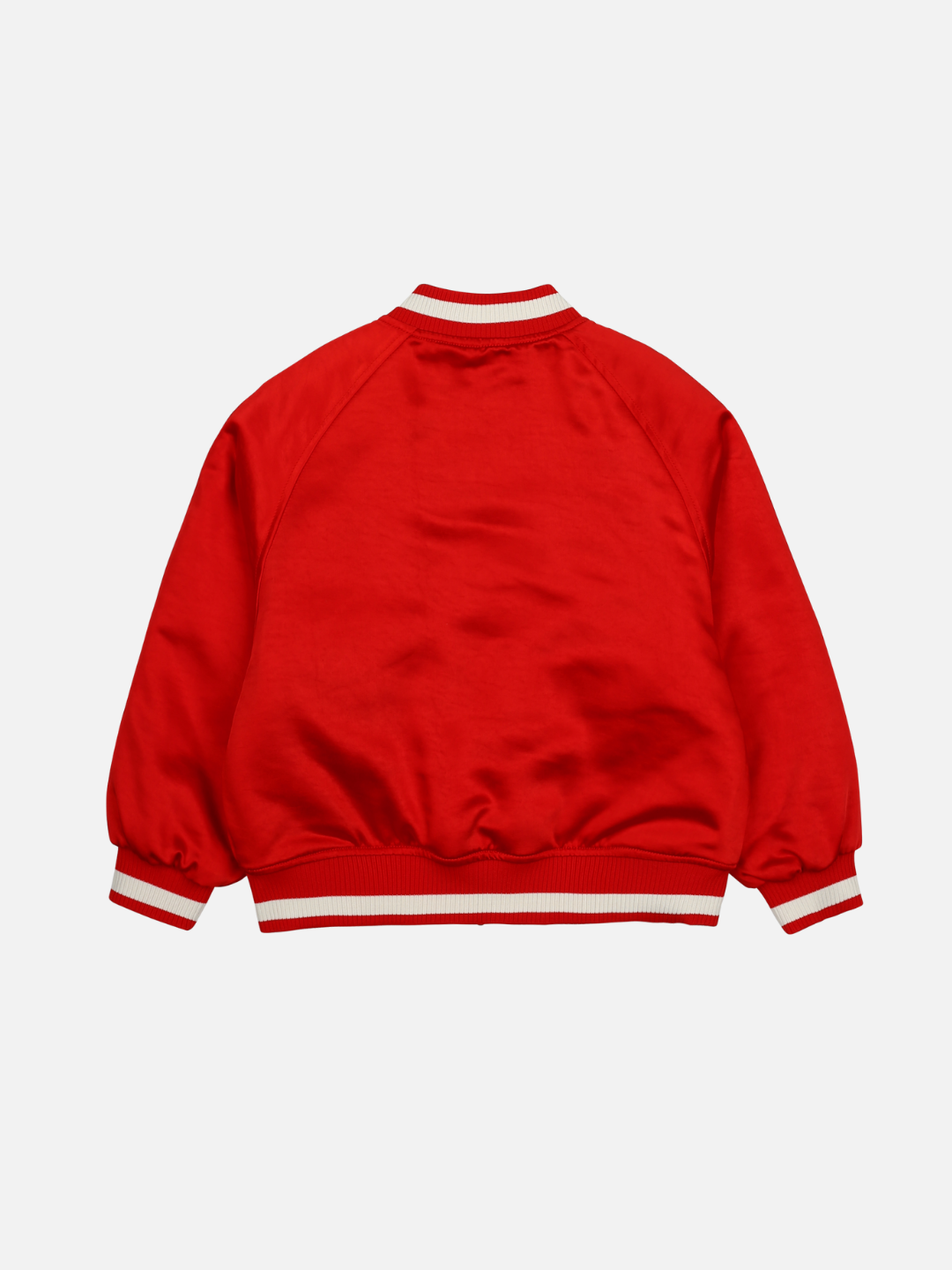 A BOOM REVERSIBLE JACKET in red with white stripes on the collar, cuffs, and waistband is laid flat on a white background, showcasing its back side. Perfect for merchandising displays or online alt text purposes.