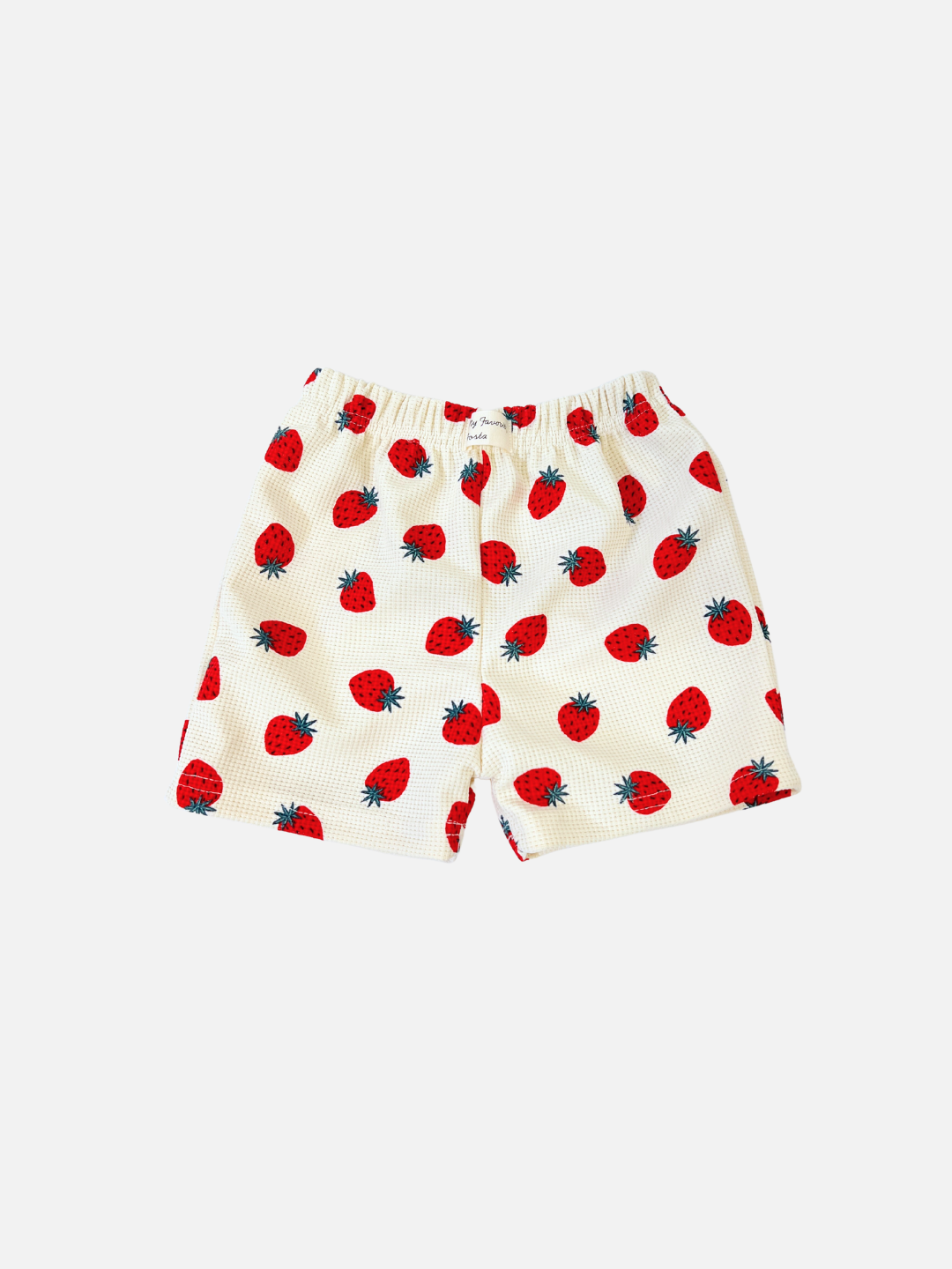 The STRAWBERRY WAFFLE SHORTS showcase red strawberries with green leaves on a plain white background.