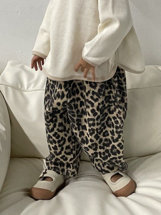 Second image of Light | LEOPARD CORDUROY PANTS: Child-sized cotton corduroy pants with a leopard print and elastic waistband from a popular Korean brand, shown on a white background.
