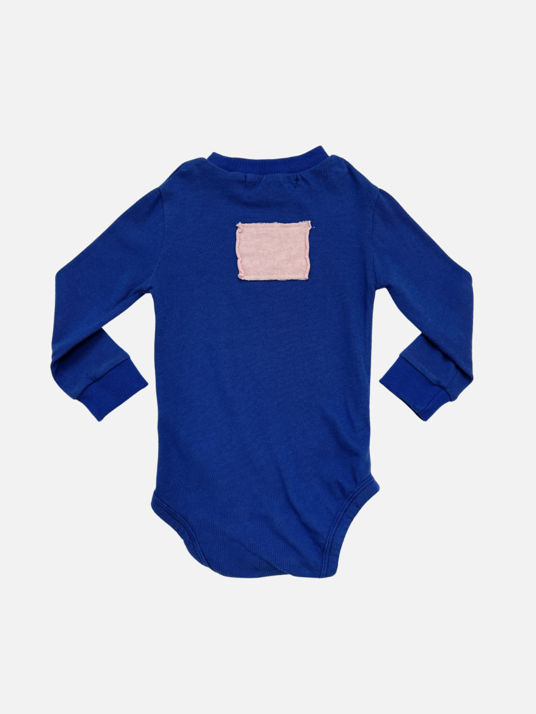 Blue | Back view of the patch onesie in Blue with pink rectangular patch on the back