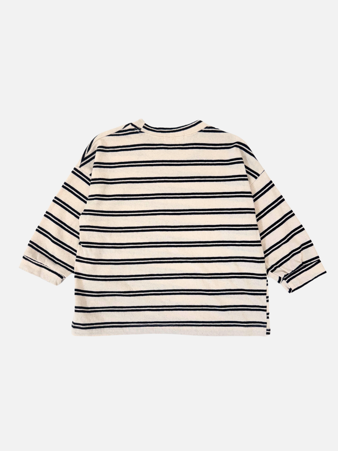 Black & White | The PEPPER LONGSLEEVE TEE, a beige cotton top with black horizontal stripes and a boxy silhouette, is laid flat on a plain white background.