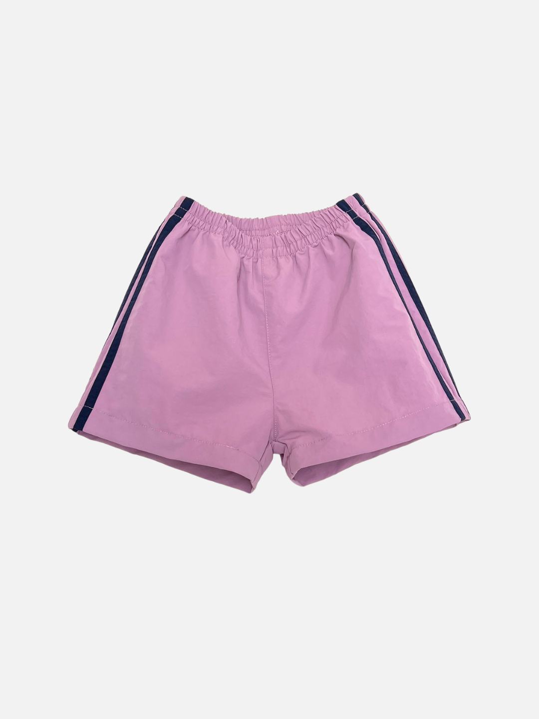 Lilac | The SPRINTER SHORTS in lilac feature an elastic waistband and navy side stripes, shown against a plain white background.