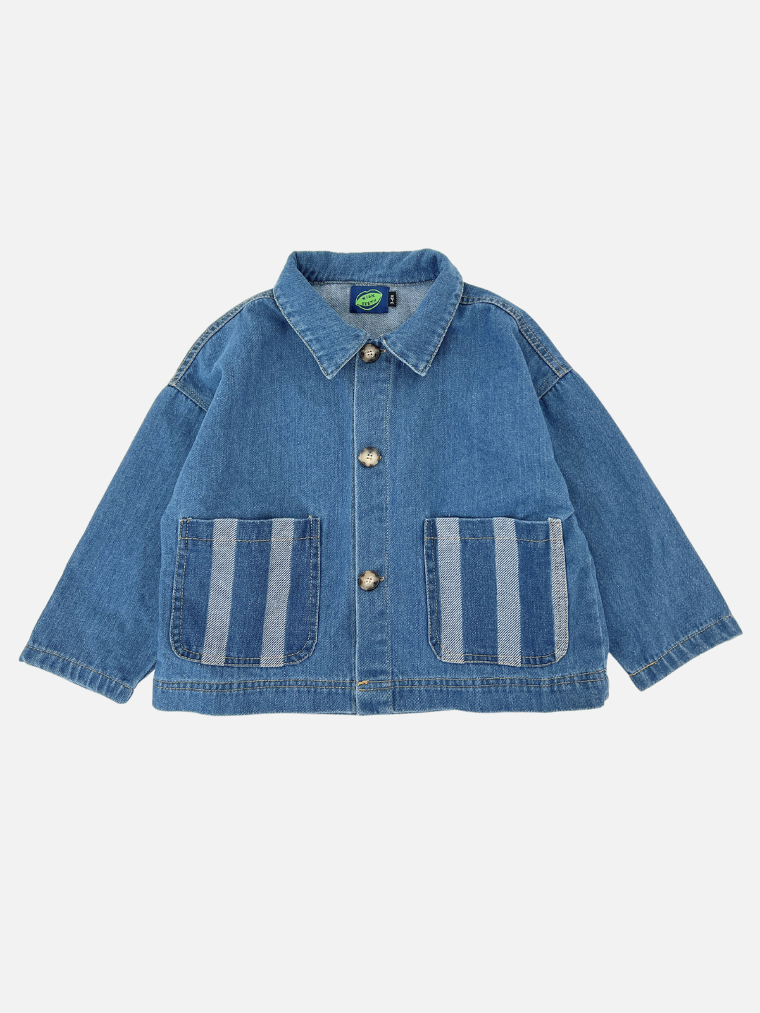 Medium Wash | Introducing the STRIPE POCKET CHORE COAT, a medium wash cotton denim jacket with buttons and two large front pockets adorned with vertical striped patterns, reminiscent of the practical style of a chore coat.