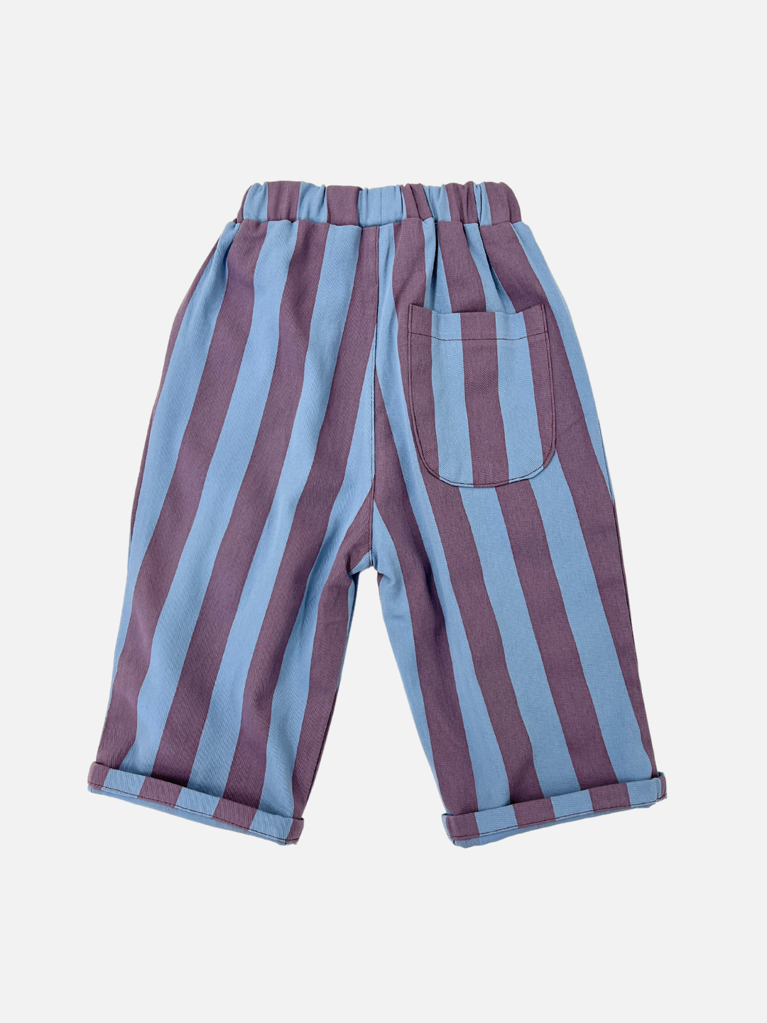Purple | Back view of kids baggy pants in blue with wide purple vertical stripes.