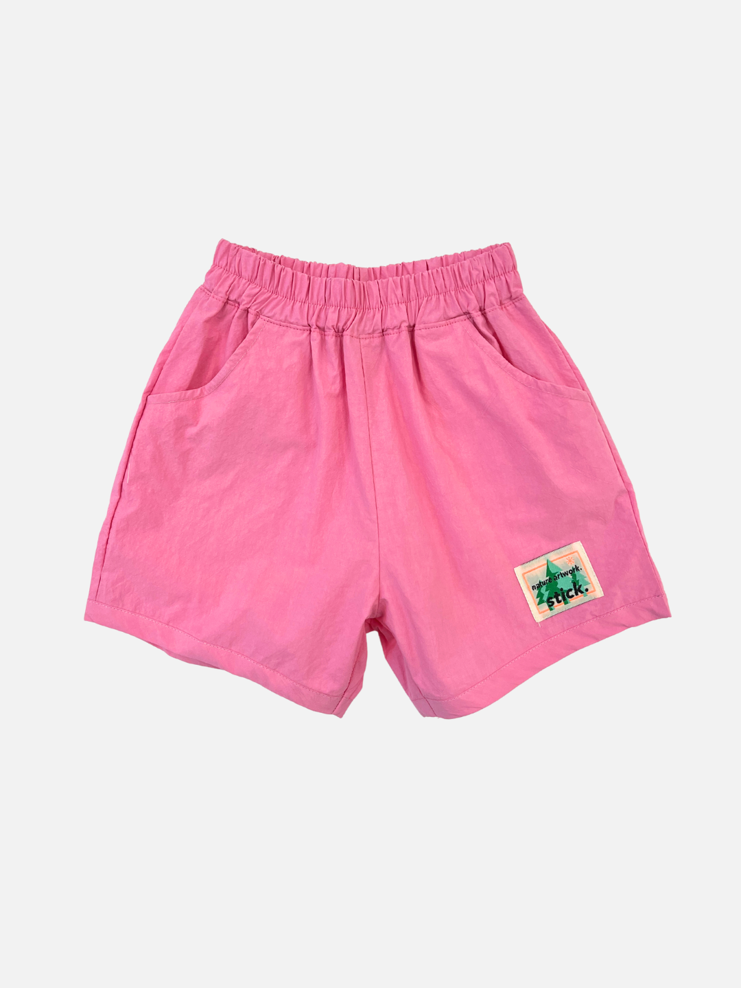 Front view of kids' pink shorts.