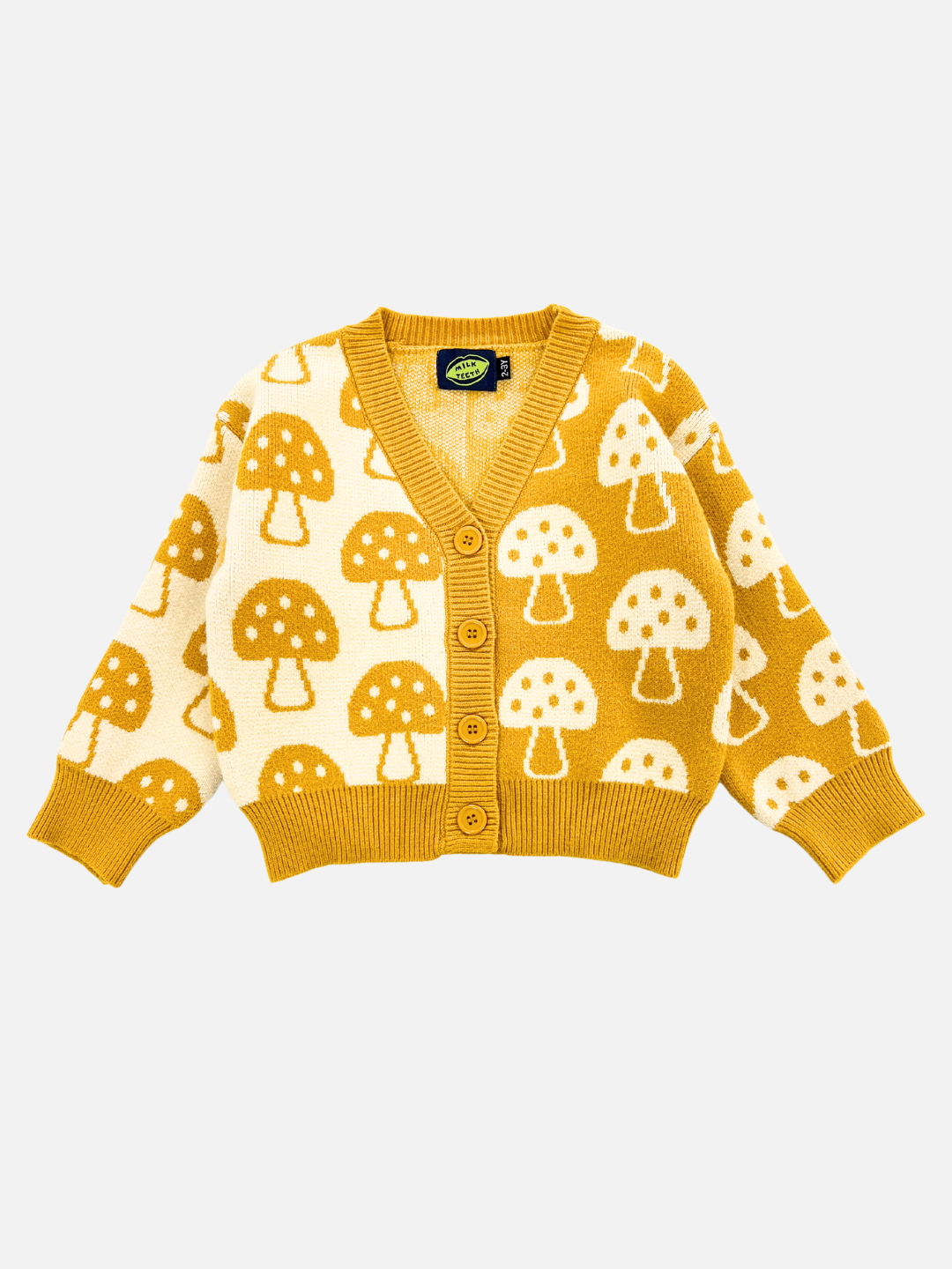 The SHROOM CARDIGAN, a mustard yellow cardigan adorned with beige mushroom patterns, featuring a V-neck and three buttons down the front, is perfectly described in detail for clarity.