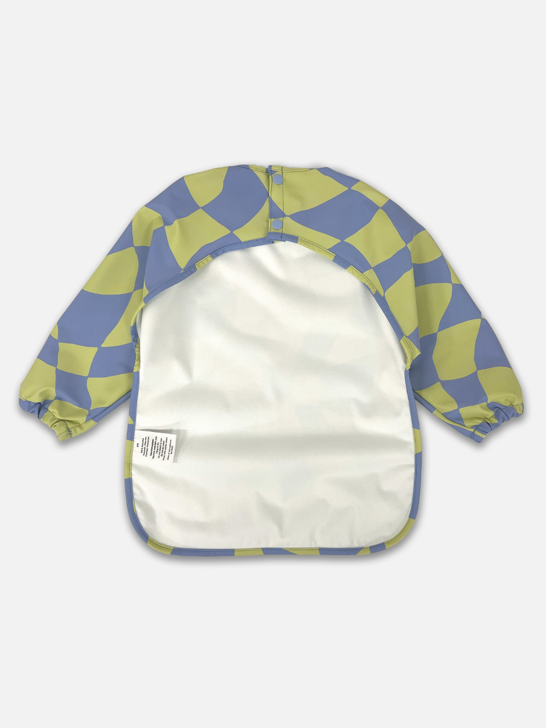 Back view of the long sleeve light green and blue wavy checked bib with a back cut out and two buttons for closure.