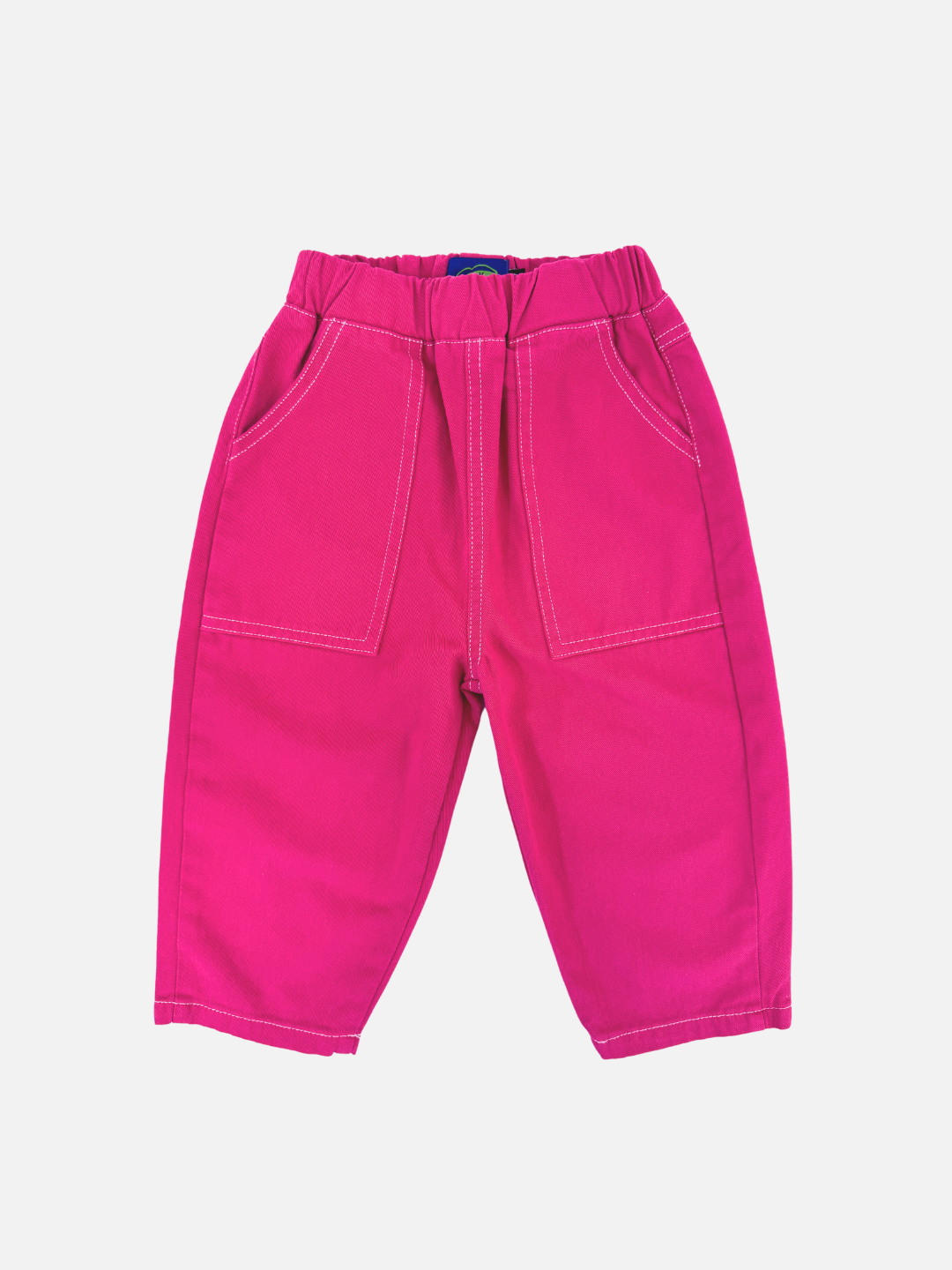 Magenta | Magenta children's TOPSTITCH TWILL PANTS made from soft cotton twill, featuring two front pockets and an elasticated waist, displayed against a white background.