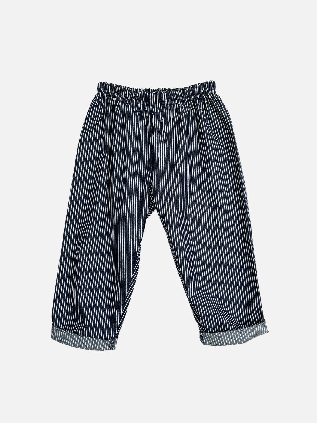 Front view of kids dark blue pants with narrow white vertical stripes, cuffed at the ankle.