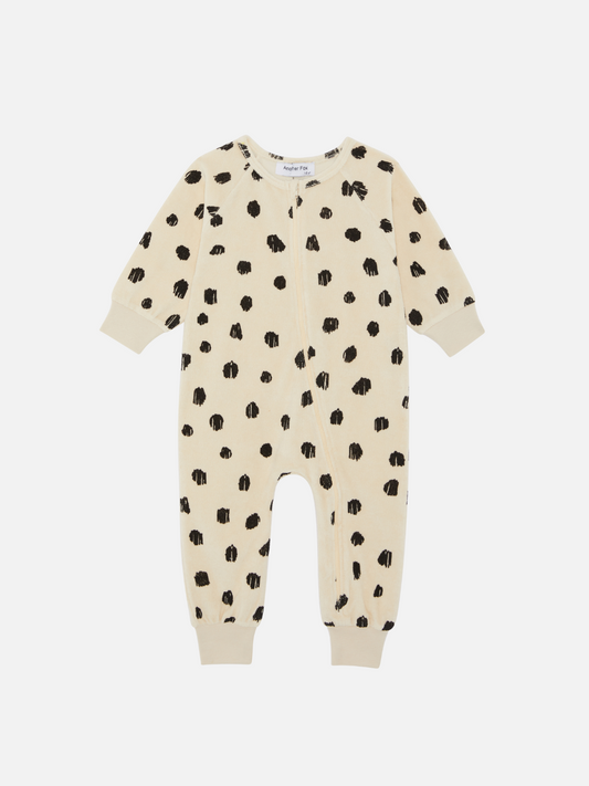 Image of Front view of the baby Cheetah Terry Towel Sleepsuit featuring a zipper. Black cheetah spots on ivory background.