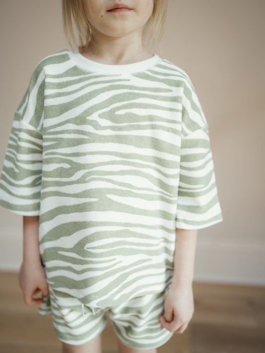 Second image of Tiger | A front view of the kid's tee in green tiger print