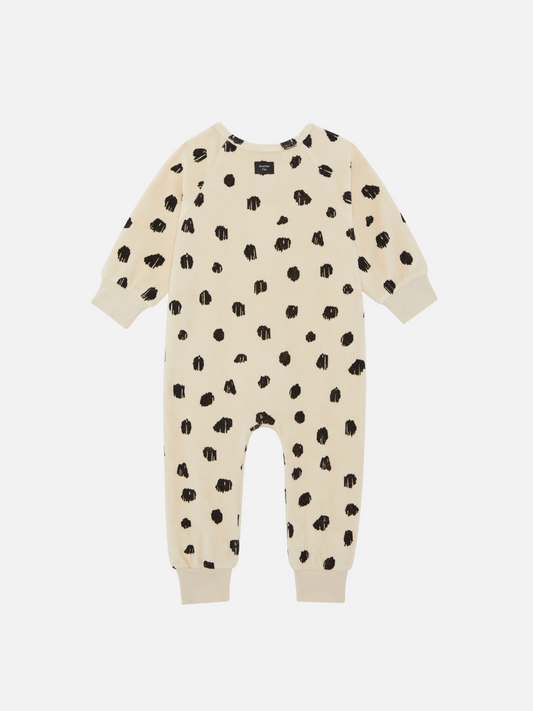 Second image of Front view of the baby Cheetah Terry Towel Sleepsuit featuring a zipper. Black cheetah spots on ivory background.