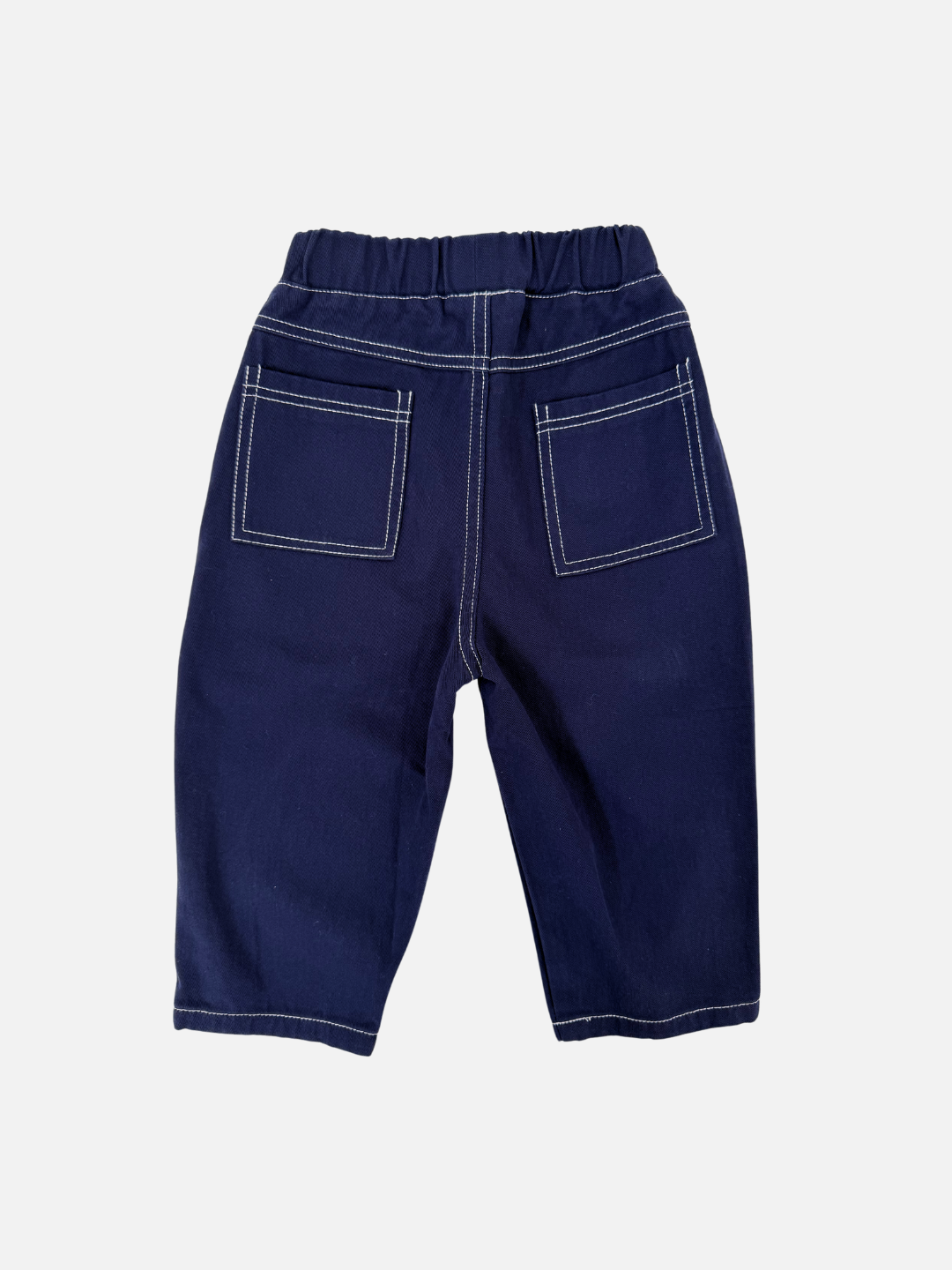 Navy | The TOPSTITCH TWILL PANTS are soft cotton twill children's trousers with a relaxed pull-on style, featuring an elastic waistband and two back pockets, showcased against a plain background.