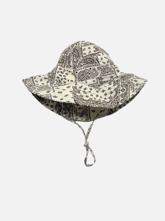Image of White | Paisley bandana patterned baby bucket hat with a strap on a white background