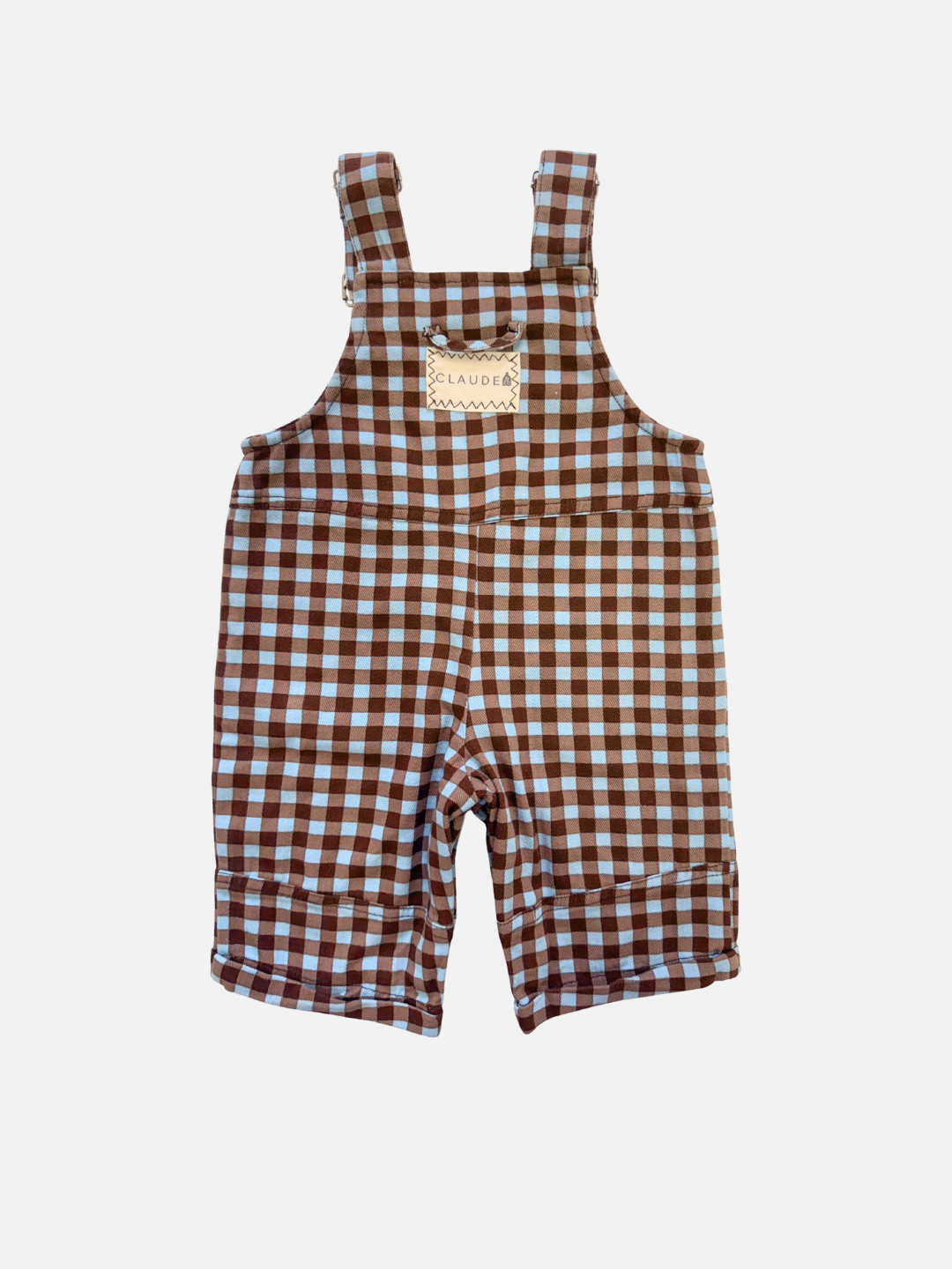 Brown and white checkered overalls on a light gray background