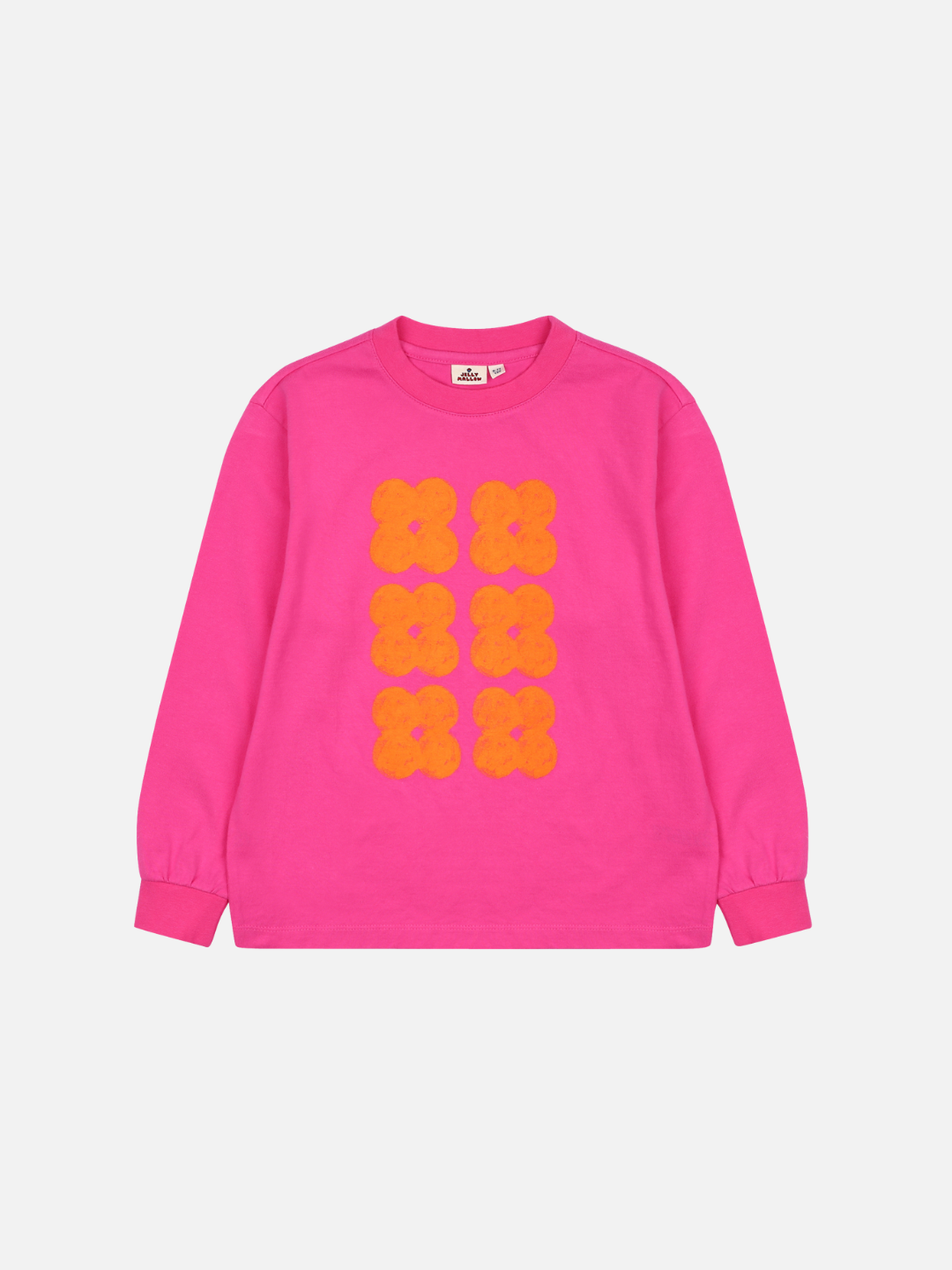 Front of Clover Long Sleeve Tshirt. Hot pink long sleeve t-shirt with six bright orange clovers in two rows down the center front.
