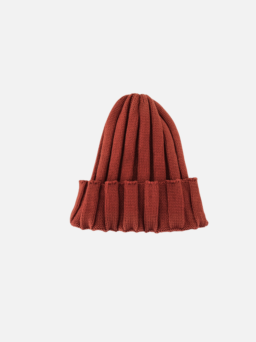 Brown | Brown knit beanie on a light beige background