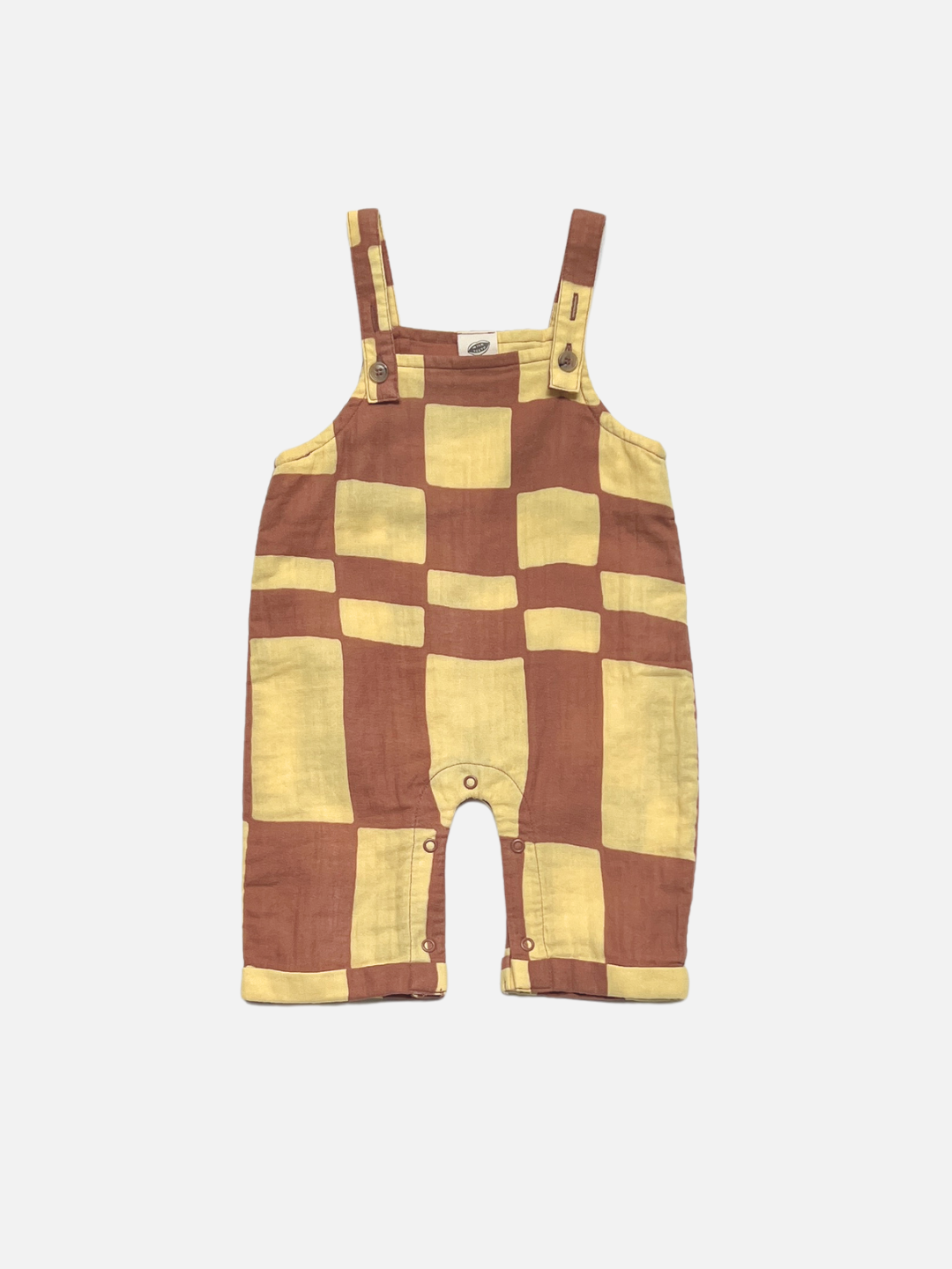 Yellow Checkers | MUSLIN OVERALLS: Sleeveless baby romper in Yellow Checkers, crafted from organic cotton muslin with adjustable buttoned shoulder straps and crotch snap closures.