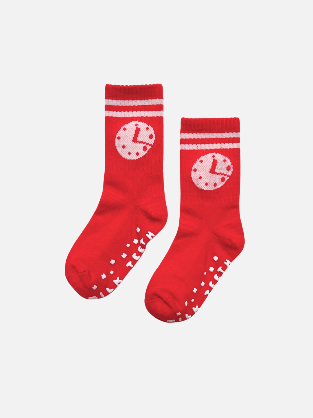 Red socks with white patterns on a light gray background